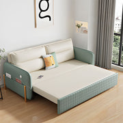 Sofa bed unfolded into bed mode for sleeping or lounging in small apartments