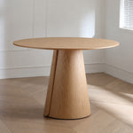 Load image into Gallery viewer, Modern Round Dining Table with Walnut Veneer Top & Travertine-Inspired Pedestal Base