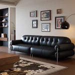 Load image into Gallery viewer, Modern Black Tufted Leather Sofa Minimalist Deep Seat Couch with Sculptural Armrests