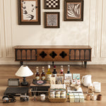 Load image into Gallery viewer, Wooden tv stand with decorative items on a wooden floor