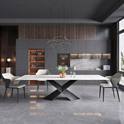 An exquisitely elegant living room arrangement featuring a dining table, a sideboard, and walls finished in a cohesive gray palette.