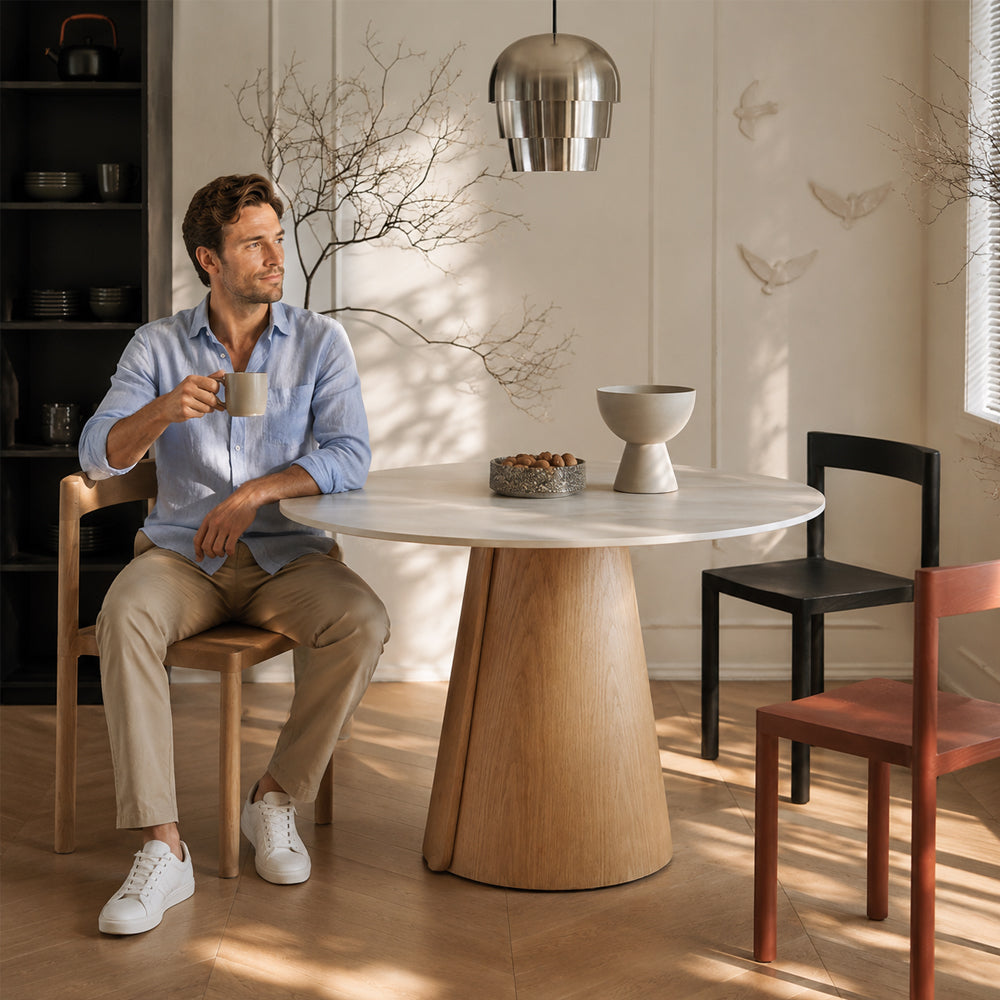Modern Round Dining Table with Walnut Veneer Top & Travertine-Inspired Pedestal Base