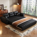 Load image into Gallery viewer, Sofa bed partially converted to a bed with storage visible underneath
