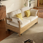 Load image into Gallery viewer, Side view of fabric sofa bed with spacious storage area revealed
