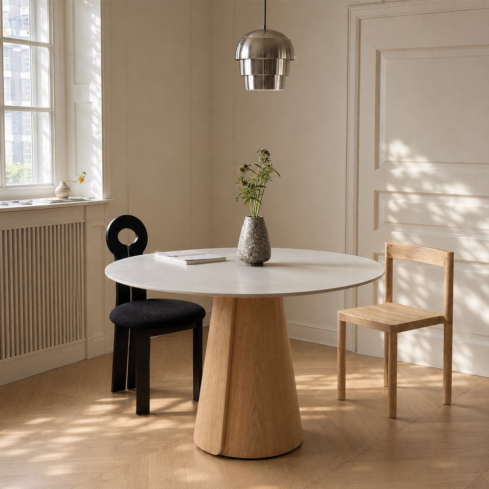 Modern Round Dining Table with Walnut Veneer Top & Travertine-Inspired Pedestal Base