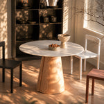 Load image into Gallery viewer, Modern Round Dining Table with Walnut Veneer Top &amp; Travertine-Inspired Pedestal Base
