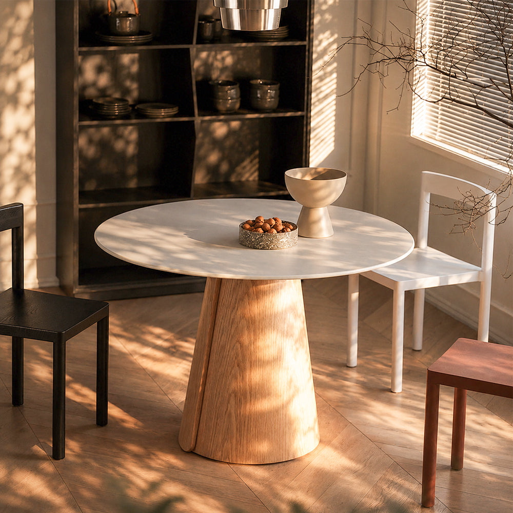 Modern Round Dining Table with Walnut Veneer Top & Travertine-Inspired Pedestal Base