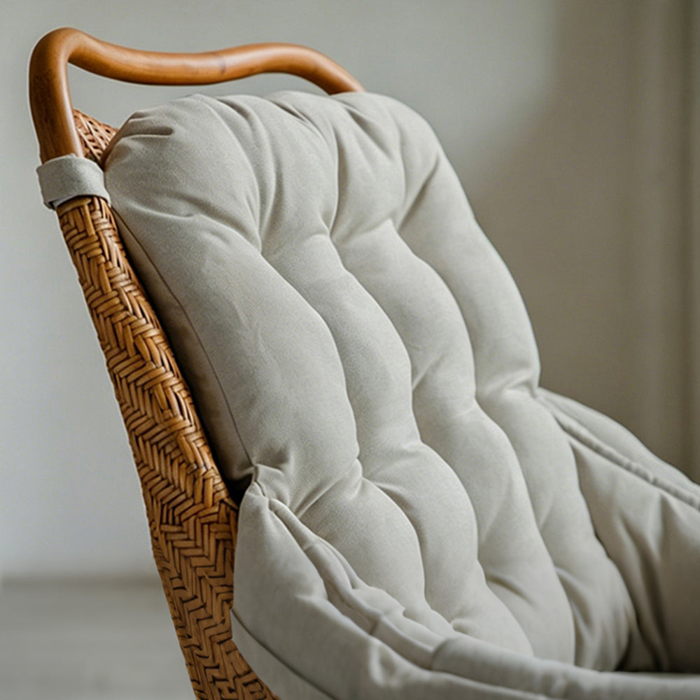 Boho Rattan Lounge Chair with Tufted Cushion and Relaxed Seating