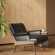 Contemporary Black Leather Lounge Chair with Warm Walnut Wood Details