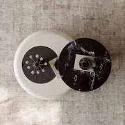 Modern Sculptural Coffee Table with Elevated Marble Glass Top and Curved Base Design