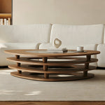 Load image into Gallery viewer, Modern Oval Wood Coffee Table with Glass Inlay Sculptural Layered Base

