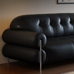 Load image into Gallery viewer, Modern Black Tufted Leather Sofa Minimalist Deep Seat Couch with Sculptural Armrests
