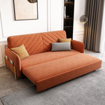 Load image into Gallery viewer, Close-up of sofa bed’s velvet upholstery and tufted seat design
