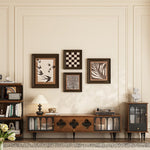 Load image into Gallery viewer, Living room with wooden furniture, decorative wall art, and a lamp.
