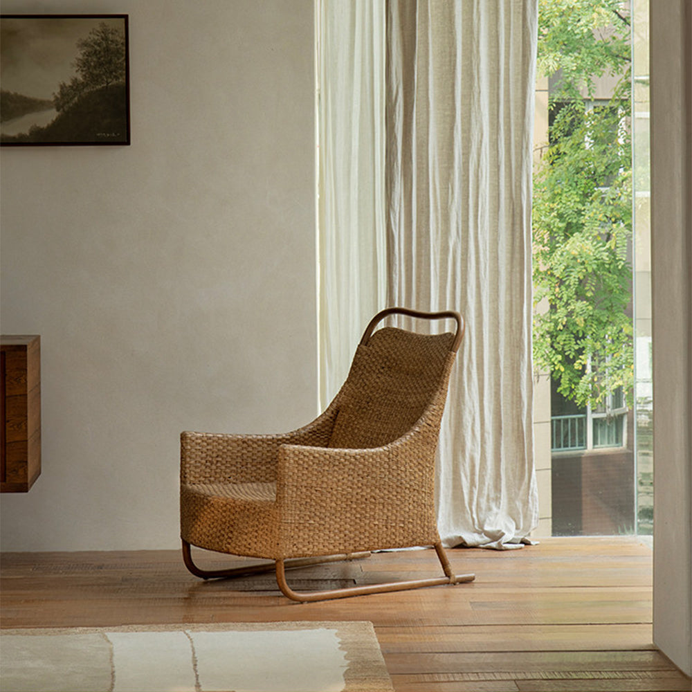 Boho Rattan Lounge Chair with Tufted Cushion and Relaxed Seating