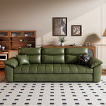 Load image into Gallery viewer, Living room arrangement with convertible sofa bed and decor
