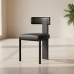 Load image into Gallery viewer, Modern Minimalist Sculptural Dining Chair Faux Leather Seat with Asymmetrical Geometric Backrest
