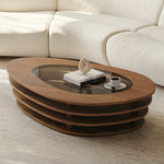 Load image into Gallery viewer, Modern Oval Wood Coffee Table with Glass Inlay Sculptural Layered Base
