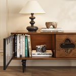 Load image into Gallery viewer, Wooden tv stand with shelf for books, a camera, and a lamp on a neutral background
