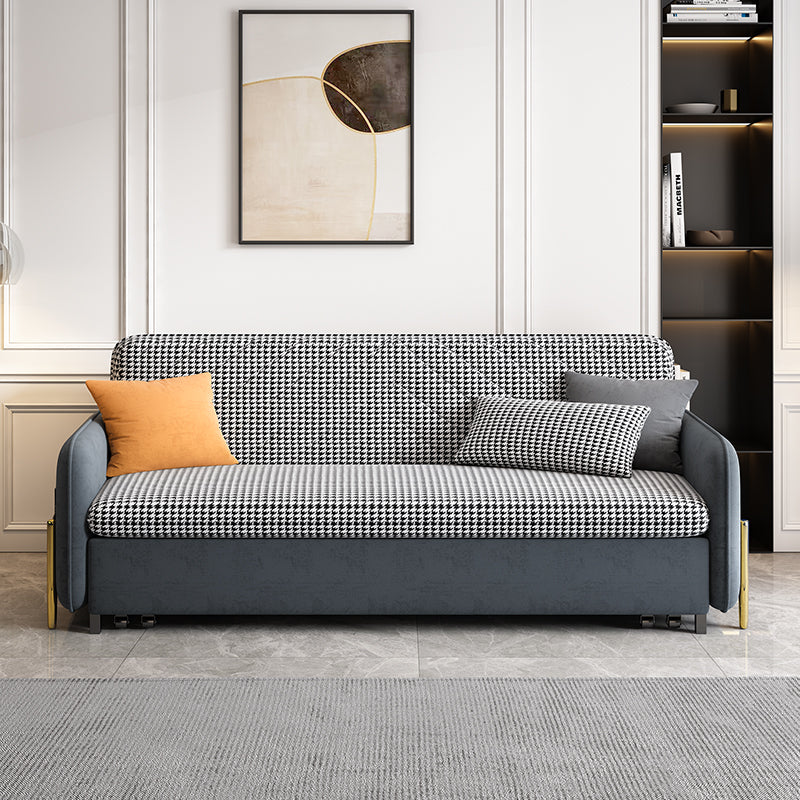 Gray checkered sofa with cushions in a modern living room setting