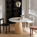 Load image into Gallery viewer, Modern Round Dining Table with Walnut Veneer Top &amp; Travertine-Inspired Pedestal Base
