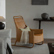 Boho Rattan Lounge Chair with Tufted Cushion and Relaxed Seating